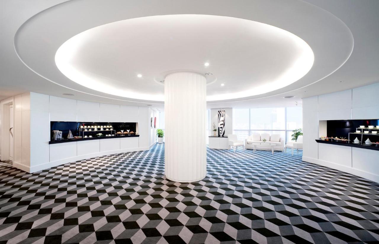Pullman Bangkok Hotel G Exteriér fotografie The interior of the 10000 m2 (107,600 sq ft) headquarters of the company in Munich, Germany